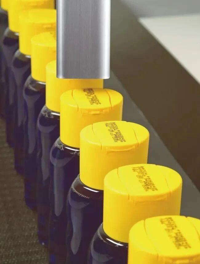 CYCJET inkjet printing system printer date code on bottle cover
